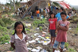 DMC/Merlin Keyword: TYPHOONHAIYAN  Please credit Pio Arce/Genesis Photos
Gelian dela Cruz (11) is worried that her school is ruined. She was even excited to do an oral recitation the day when the storm struck their town in Barangay Libertad, Bogo City, Cebu. The full scale of the disaster caused by Typhoon Haiyan in the Philippines is only now becoming apparent.