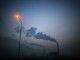 Smoke rises from chimneys of a thermal power plant near Shanghai March 26, 2014.   REUTERS/Carlos Barria